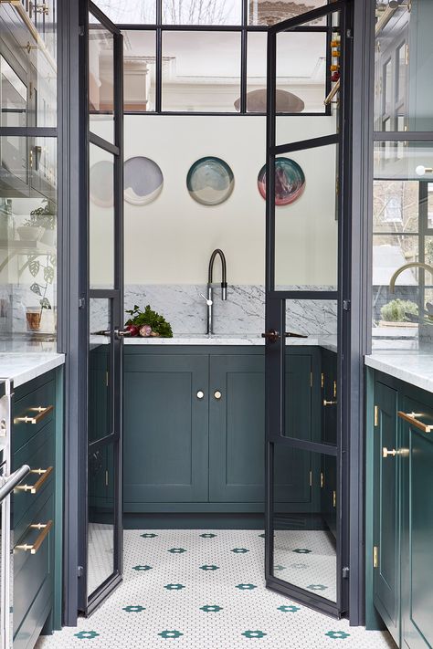 Crittall doors create an elegant separation between the clean and dirty parts of working kitchen life. Using Crittall offers a line of vision which connects the two spaces and allows light to penetrate. Walk In Pantry Ideas, Blakes London, Crittal Doors, Pretty Tiles, Perfect Pantry, Larder Cupboard, Dirty Kitchen, Bespoke Kitchen Design, Style Pantry