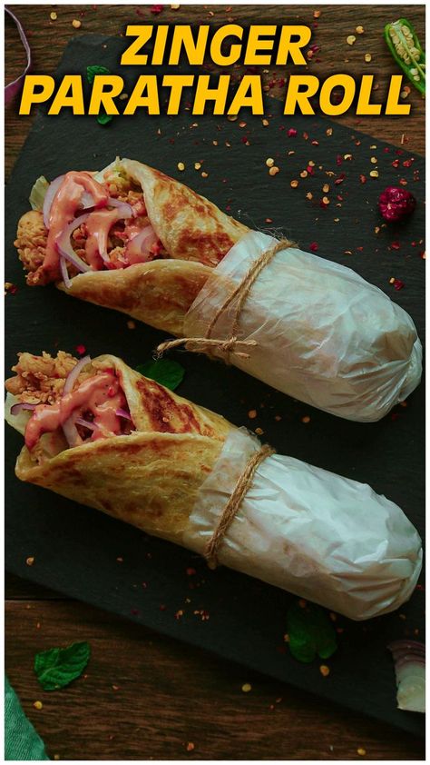 Food cravings in this quarantine are seriously major, so here is this zinger paratha roll recipe for you. Make zinger like a professional by following these simple steps and results will amaze you. Do give this Zinger Paratha Roll recipe a try and share your feedback with us. #zingerparatharoll #paratharoll #pinterestrecipes #pinterestideas #pinterestworthy #foodphotos #foodpics #foodphotography #foodimages #pinterestinspired #foodstyling #Sooperchef #foodpresentation Paratha Roll Recipe, Pakistani Street Food, Chicken Zinger, Paratha Roll, Iftar Recipes, Tandoori Masala, Paratha Recipes, Cheese Rolling, Roll Recipe