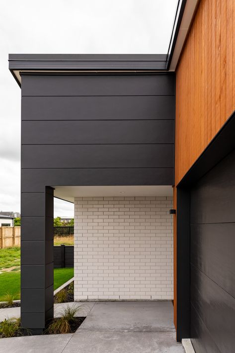 Our stunning new Rototuna / Kinfields Show Home features a mix of exterior claddings - Shiplap (vertical), James Hardie Stria (horizontal) and Modus White Brick. We love this look!  #generationhomesnz #exteriorcladding #newhome #showhome #rototunavillage #kinfields James Hardie Stria, Shiplap Vertical, Cypress House, 3 Bedroom House Plan, House Cladding, James Hardie, Home Board, Exterior Cladding, White Brick