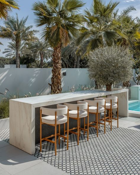 🌴check out this stunning outdoor space designed by @robakraytem_design, featuring our DAISY tiles🌴 . the outcome is amazing—elegant, contemporary, and incredibly minimalist . with a delicate pattern and timeless color palette, the space brings a refreshing, relaxing vibe . ✨imagine coming home after a hectic day to enjoy quality time surrounded by beautiful design, truly a haven for relaxation and inspiration✨ . . 📸@dua.photography.studio . . @mosaico_tiles#homedecorinspo#cementtiles#ecofrien... Polished Concrete Outdoor Area, Tiled Outdoor Area, Ash Landscape, Contemporary Pool Design, Mediterranean Homes Exterior, Beach House Renovation, Contemporary Landscape Design, Dubai Houses, Timeless Color Palette