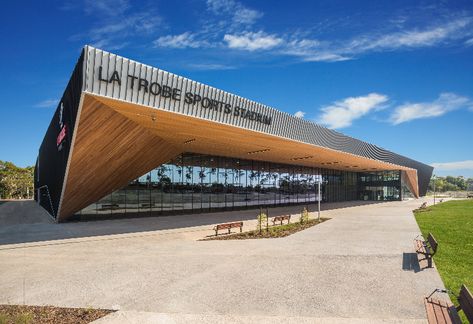 The La Trobe Sports Stadium is based at La Trobe University’s Bundoora campus. The new state of the art facility was part of La Trobe’s $150 million Sports Park development – a key component of the University’s ambitious $5 billion University City of the Future plan to transform Melbourne’s north. Hub Design, Melbourne Architecture, Sport Park, Sports Stadium, Architecture Images, Best Architects, Australian Architecture, Education Architecture, Natural Ventilation