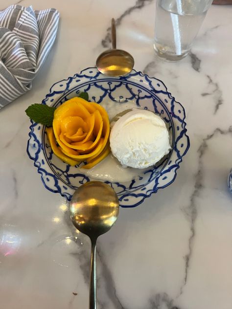 Flower shaped mango laying beside a bed of mango sticky rice with a coconut ice cream on top Rice Coconut, Mango Sticky Rice, Mango Ice Cream, Coconut Ice, Coconut Ice Cream, Thai Dessert, Sweet Caroline, Sticky Rice, Mango