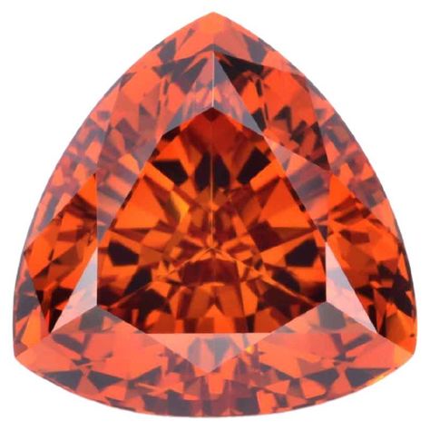 Lively 6.67 carat trillion Mandarin Garnet gem, offered unmounted to a gem lover. Dimensions: 10.80mm x 10.80mm x 7.20mm. Returns are accepted and paid by us within 7 days of delivery. We offer supreme custom jewelry work upon request. Please contact us for more details. For your convenience we carry an extensive world-class loose gemstone collection. Chrysoberyl Ring, Imperial Topaz Ring, Rhodolite Garnet Ring, Green Tourmaline Ring, Gemstone Collection, Garnet Gem, Imperial Topaz, Garnet Ring, Rhodolite Garnet