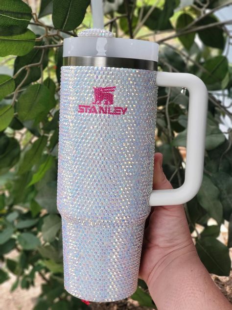 Absolutely stunning White AB Rhinestone Stanley 30oz  cup! Get yours just in time for the holidays!  Each tumbler is hand placed with premium rhinestones and sealed with industrial strength crystal adhesive to insure a long lasting & sterdy life!  💥GUARANTEE💥 because it's life & accidents DO happen, I will include spare rhinestones in each order to ensure your stanley always sparkles!  I also provide a lifetime guarantee of rhinestone replacements! All you need to do is cover the small cost of Stanley 30oz, Stanley Tumbler, Stanley Cup, Just In Time, Hobbies, Tumbler, Long Lasting, Let Me, Display Homes