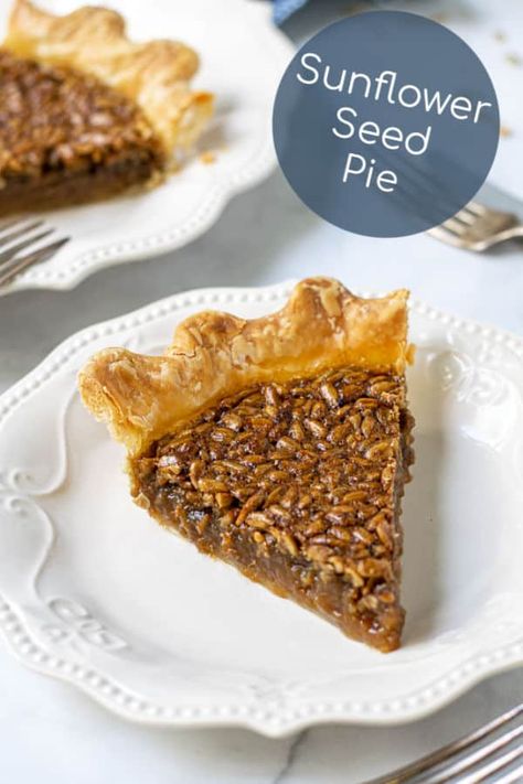 Sunflower Seed Pie is sure to be a crowd pleaser! This nut free pie is a great alternative to pecan pie. Easy to make in a few simple steps this unique sunflower pie is delicious and perfect for the Thanksgiving table. #sunflowerseedpie #nutfree #thanksgivingpies #easy #unique Sunflower Pie, Sunflower Seed Recipes, Quick Sweets, Wife Recipes, Christmas Recipes For Kids, Christmas Main Dishes, Pecan Pie Easy, Baking Recipes For Kids, Pie Easy