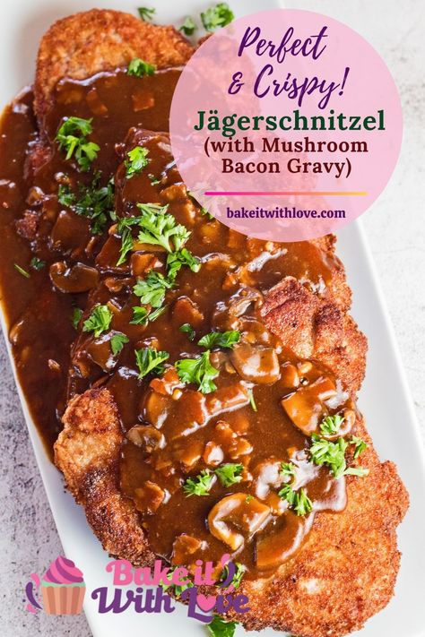 The classic German Jägerschnitzel combines tender, crispy-fried breaded pork cutlets served with a deliciously rich bacon mushroom gravy! This is truly a hearty pork entree that the whole family will love any day of the week served with potatoes or spätzle! bakeitwithlove.com | #bakeitwithlove #easy #recipe #classic #best #authentic #vintage #German #Jägerschnitzel #huntersschnitzel #schnitzel #mushroomgravy #Germany #gravy #authentic #jaegerschnitzel #rezept #porkcutlets #panfriedpork Authentic German Spaetzle With Mushroom Gravy, German Schnitzel With Mushroom Gravy, Jager Schnitzel Recipe Mushroom Sauce, Yager Schnitzel Recipe, Pork Snitzel Recipe Germany, Jager Schnitzel Recipe, Pork Schnitzel Recipe Gravy, Schnitzel Recipe Pork, Jager Schnitzel