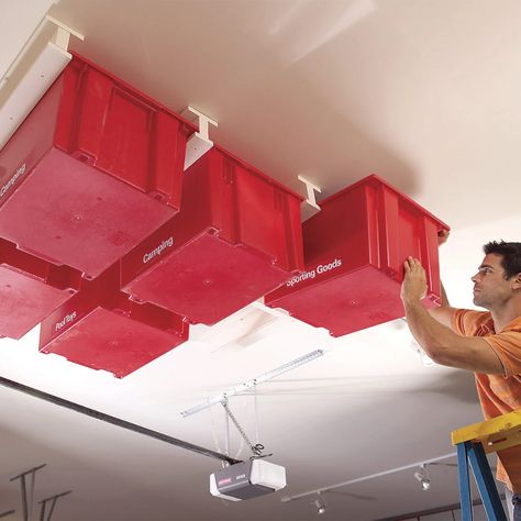 If your garage is running out of space, try building this overhead storage system. The construction is simple and fast, and the whole system is made with st Diy Overhead Garage Storage, Garage Ceiling Storage, Laundry Room Storage Shelves, Garage Organization Tips, Overhead Garage Storage, Room Storage Diy, Overhead Garage, Shed Organization, Garage Storage Solutions