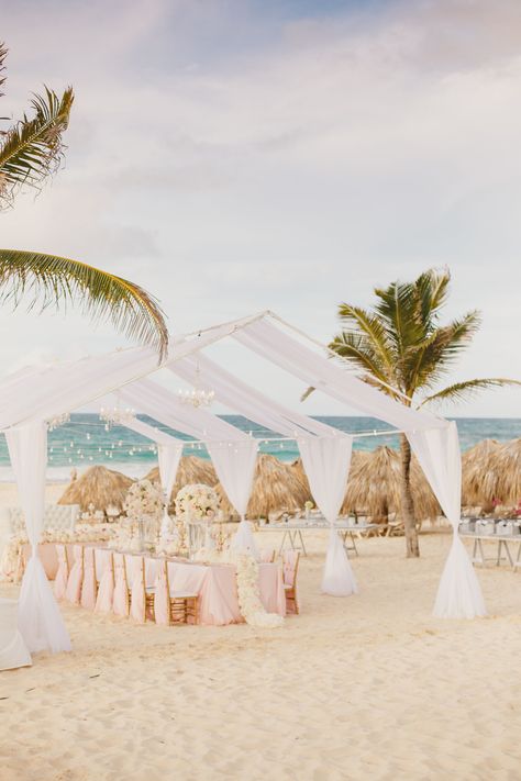 Wedding reception on the beach in the Dominican Republic. Destination wedding at the Hard Rock Punta Cana Resort. Glam wedding reception on the beach. Pink and gold beach wedding.  #destinationwedding #beachwedding #glamwedding #puntacana Glam Wedding Reception, Hard Rock Punta Cana Wedding, Elegant Beach Party, Pink Beach Wedding, Cheap Beach Wedding, Gold Beach Wedding, Beach Wedding Pink, Hard Rock Punta Cana, Destination Wedding Reception