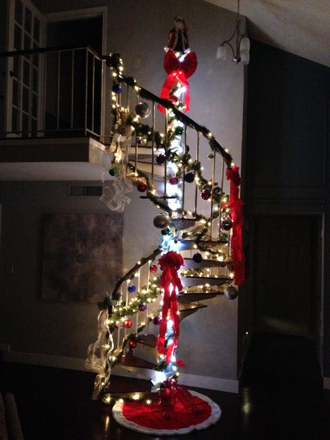 All lit up Spiral Stairs Christmas Decorations, Christmas Spiral Staircase, Spiral Staircase Christmas Decor, Xmas Projects, Creative Christmas Trees, Spiral Stairs, Spiral Staircase, Christmas 2024, Xmas Decorations