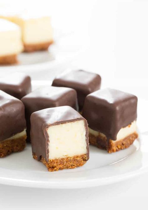 Cheesecake bites are nothing more than little chocolate-covered bites of creamy cheesecake. No special equipment and no water bath needed, since chocolate covers all. SO good! Mini Cheesecake Bites, Tiny Bites, Dessert Inspiration, Gluten Free Cheesecake, How To Make Cheesecake, Cake Bites, Cheesecake Bites, Desserts Recipes, Savoury Cake