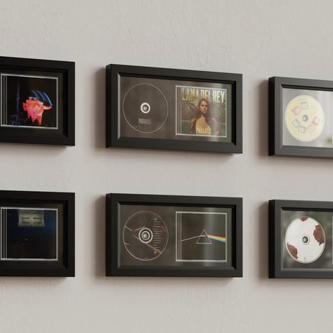 PRICES MAY VARY. 100% Wood + Plexiglass + EVA Board + Flocked Fabric Versatile CD Display Frame: Use this 7.7"x14.4" display frame to showcase your favorite CD cases, discs, and even signed memorabilia, designed specifically for music enthusiasts and collectors. High-Quality Construction: The frame features a durable wooden border, providing a sturdy and stylish foundation for displaying your CDs. It includes a luxurious black flocked fabric to enhance the presentation of your CD collection, off Mens Bedroom Wall Decor, Vinyl Record Room Decor, Gallery Wall Examples, Vinyl Record Wall Display, Record Wall Display, Vinyl Record Room, Cd Display, Gallery Wall Template, Artsy Decor