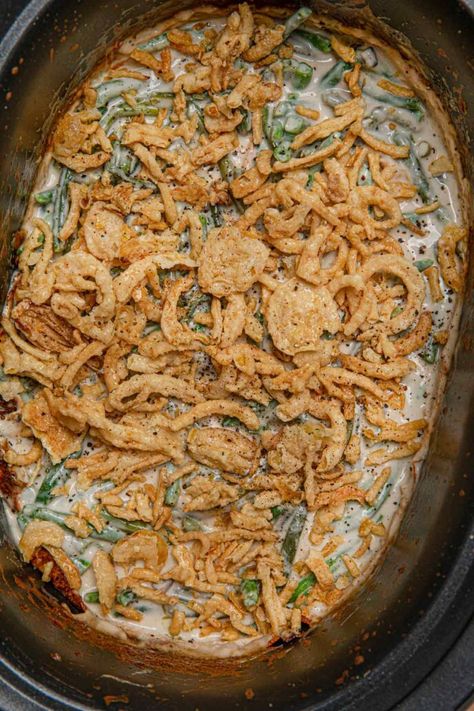 Slow Cooker Green Bean Casserole is a classic holiday creamy side dish with mushroom soup topped with crispy onions. Save the oven space and no dry green beans! #greenbeans #greenbeancasserole #holiday #christmas #thanksgiving #sidedish #holidayrecipe #dinnerthendessert Green Bean Casserole Crockpot, Overnight Turkey Recipe, Casserole Slow Cooker, Casserole Crockpot Recipes, Best Green Bean Casserole, Slow Cooker Green Beans, Classic Green Bean Casserole, Slow Cooker Pot Roast, Green Beans Side Dish