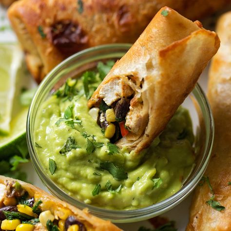 Southwest Egg Roll Recipe Southwest Egg Rolls, Favorite Party Appetizers, Southwestern Egg Rolls, Spinach Tortilla, Lil Luna, Chicken Corn, Fresh Guacamole, Deep Fried Food, Egg Roll Recipes