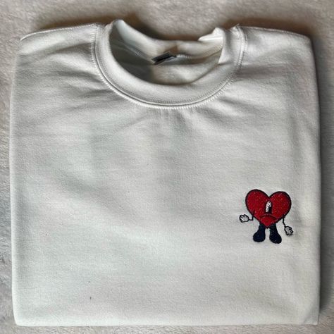 Bad Bunny/ Carrbear hugging embroidered crewnecks Bad Bunny Tumbler, Bad Bunny Heart, Bunny Heart, Kurta Pajama Men, Bad Bunny, Hoodie Design, Small Designs, Black Grey, Shirt Designs