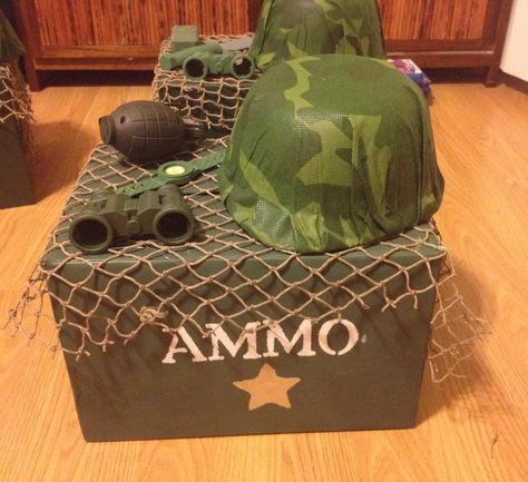 Camouflage party centerpiece Army Birthday Party Centerpieces, Camouflage Centerpiece Ideas, Call Of Duty Centerpieces, Army Centerpiece Ideas, Army Party Decorations, Camouflage Birthday Party, Army Themed Birthday, Soldier Party, Camo Birthday Party