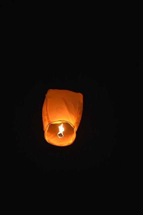 How to Make Sky Lanterns in Seven Steps | Craft Schmaft Diy Floating Lanterns, Flying Paper Lanterns, Floating Paper Lanterns, Lantern Wallpaper, Lantern Image, Candle In The Dark, Flying Lantern, Floating Lanterns, Blurred Background Photography