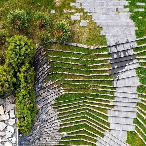 Digital Architecture & Design on Instagram: "SANCAKLAR MOSQUE | by EAA- Emre Arolat Architecture
@eaa_emrearolatarchitecture

EAA: "Sancaklar Mosque located in Buyukçekmece, a
suburban neighborhood on the outskirts of lstanbul, aims to
address the fundamental issues of designing a mosque by
distancing itself from the current architectural discussions
based on form and focusing solely on the essence of religious space.

The project site is located in a prairie landscape that is
separated from the surrounding suburban gated communities by a busy highway. The high walls surrounding the park on the upper courtyard of the mosque depict a clear boundary between the chaotic outer world and the serene atmosphere of the public park. The long canopy stretching out from the park becomes the only arch Prairie Landscape, Suburban Neighborhood, Project Site, Architecture Books, Stair Steps, Public Park, High Walls, Architecture Student, Gated Community