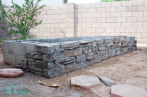 Tutorial for building a raised garden bed or herb garden using concrete cinder blocks and stone veneer. It's an easy DIY project that doesn't require any special masonry skills. Raised Herb Garden, Garden Bed Layout, Stone Planter, Cinder Block Garden, Raised Flower Beds, Cement Blocks, Vegetable Garden Raised Beds, Cinder Blocks, Building A Raised Garden