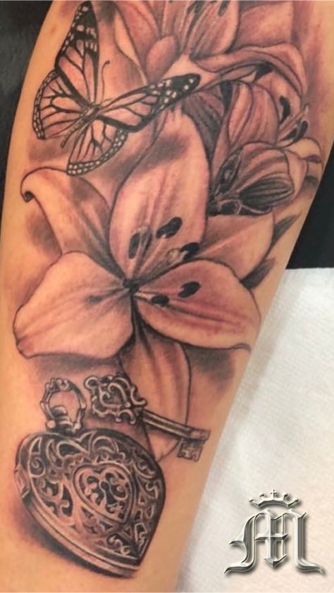 Woman’s arm tattoo. Flower, butterfly, heart locket Tattoo by Big G. #miamibeach #miamitattoos #miamitattooco Big Heart Tattoos For Women, Locket Tattoos For Women, Arm Tattoo Flower, Heart Locket Tattoo, Heart Flower Tattoo, Locket Tattoos, Anniversary Tattoo, Pearl Tattoo, Butterfly With Flowers Tattoo