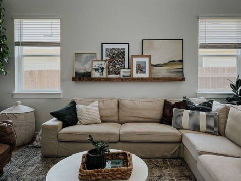 How to Style a Picture Ledge – Love & Renovations Picture Ledge Over Couch, Picture Shelf Above Sofa, Ledge Above Bed, Style A Picture Ledge, Picture Ledge Above Couch, Pictures Behind Couch, Frame A Puzzle, Art Ledge, Above Bed Ideas