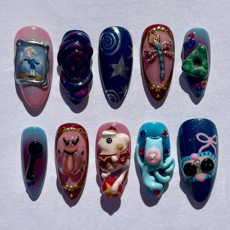 coraline 💙🐈‍⬛🎪 I had so much fun recreating the tiny painting ☺️ ib @starlightnail_s . . . #pressonnails #pressonnailbusiness #halloweennails #coraline #coralinenails #3dnailart #nailart #naildesign #handpaintednailart Painting Nails Ideas, Coraline Nails Acrylic, Weirdcore Nails, Coraline Nail Designs, Coraline Nails Art, Caroline Nails, Cosmetics Table, Eyes Nail Art, Button Nails