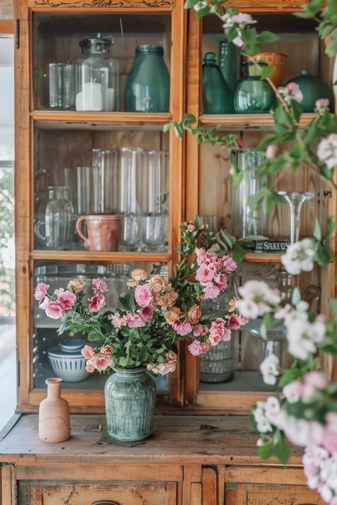 Farmhouse Hutch Decor Ideas for Cozy Charm How To Style A Dining Room Hutch, Tea Pot Display Ideas, Hutch In Living Room, Kitchen Hutch Decorating Ideas, Hutch In Dining Room, Rudtic Hutch With Wall Paper, Farmhouse Hutch Decor, Hutch Decorating Ideas, How To Style A Hutch