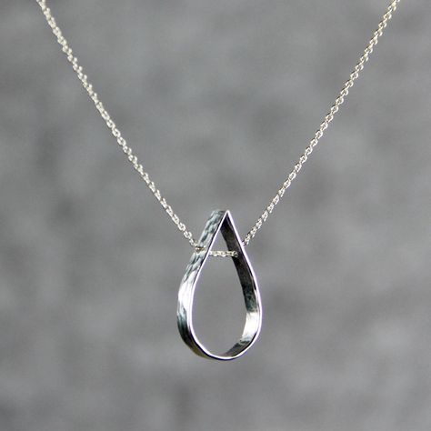 This simple teardrop pendant necklace is handmade and hand stamped using sterling silver. Slim, sheer, barely-there pendant for everyday wear. I've hand-hammered these shiny sequin dangles texture to give them a bit of sparkle. The teardrop stands for the inresistable natural gravitational force. It implies the softness of water. It is gravitating, playful and feminine. ;-) My contact number: 626-379-1904. Please contact me if you would like to order multiples or customize a design for your spec Everyday Teardrop Pendant Jewelry, Minimalist Hypoallergenic Teardrop Jewelry, Hypoallergenic Minimalist Teardrop Jewelry, Minimalist Teardrop Pendant Jewelry As Gift For Her, Minimalist Teardrop Pendant Jewelry Gift For Her, Everyday Sterling Silver Teardrop Pendant Necklace, Simple Teardrop Pendant Jewelry, Silver Sterling Drop For Gifting, Silver Teardrop Jewelry With Delicate Chain