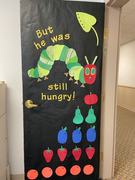 Very Hungry Caterpillar Door Decoration, March Is Reading Month Door Decorations, Hungry Caterpillar Classroom Theme, Caterpillar Bulletin Board, Eric Carle Classroom Decor, Toddler Classroom Decorations, Very Hungry Caterpillar Printables, Hungry Caterpillar Classroom, Open House Activities