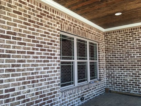 Modern appeal: Ashton Court brick combines nicely with white mortar washed with sand. Ashton Brick With Ivory Mortar, Brick Designs On Houses, Red Brick White Mortar, Red Brick With White Mortar, White Mortar Brick Exterior, Red Brick Stain, Brick With White Windows, Mortar Washed Brick Exterior, Brick With White Mortar