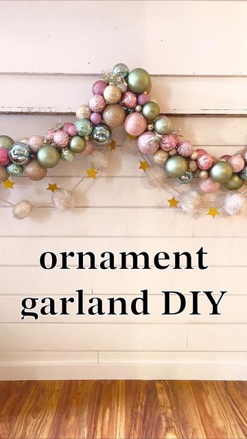 Anna ✨ on Instagram Diy Tinsel Garland, Diy Bulb Garland Christmas Balls, Diy Ball Garland Christmas, Diy Ornament Arch, How To Decorate With Tinsel Garland, How To Make An Ornament Garland, Diy Christmas Ball Garland, Diy Ribbon Garland Christmas, How To Make Ornament Garland