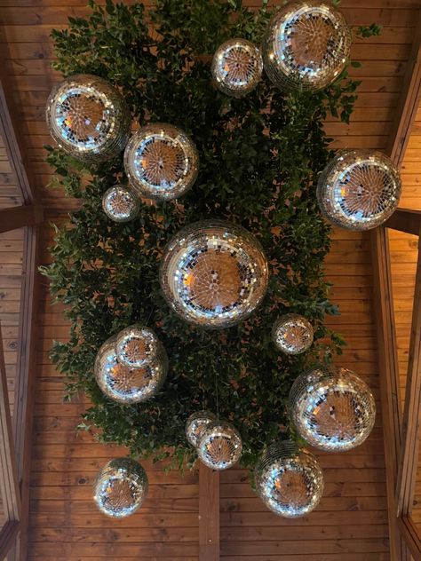 Green Disco Party, Greenery And Disco Balls, Ceremony Flowers Altar, Disco Ball Ceiling, Disco Garden Party, Disco Christmas, Christmas Fireplace Mantels, Thistle Wedding, Edgy Bridal