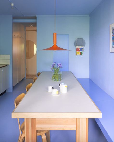 Photo 3 of 16 in This Renovated Apartment’s Primary Color Scheme Is Anything But Basic - Dwell Dining Table Along The Wall, Linoleum Dining Table, Colourful Ceiling Design, Blue Ceiling Kitchen, Colour Dining Table, Coloured Dining Chairs, Primary Color Scheme, Playful Interior Design, 80s Architecture