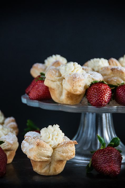 Puff Pastry Cheesecake Cups Being the mom to a little girl is so fun.  For Christmas, she got a play kitchen set and a miniature set of tables and chairs. We spend many of our afternoons having “cuppee” parties. You know instead of tea parties. Because Mommy is moderately obsessed with coffee. We sit at... Puff Pastry Cheesecake, Stuffing Cups, Puff Pastry Cups, Grapefruit Cake, Pastry Cups, Easy Puff Pastry, Cheesecake Cups, Bite Size Desserts, Pretty Dessert