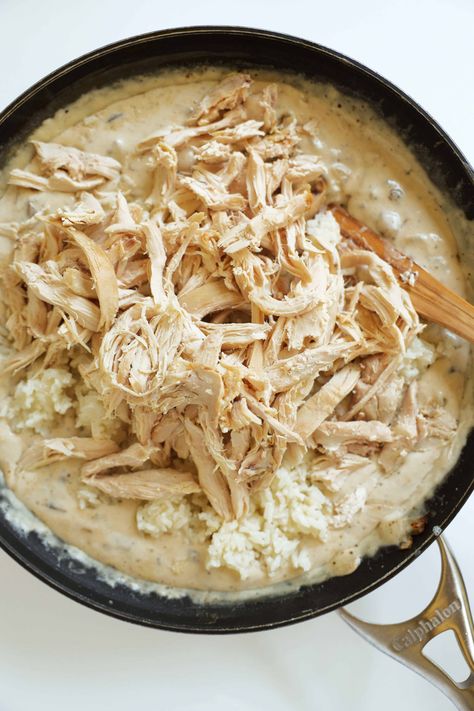 Shredded white meat chicken in a pile on top of a creamy mushroom soup in a skillet. Cream Of Mushroom Chicken And Rice Bake, Chicken And Rice Cream Of Mushroom, Chicken With Mushroom Soup, Chicken And Rice Casserole Recipe, Cream Of Mushroom Chicken, Golden Mushroom Soup, Fall Meals, Chicken And Rice Casserole, Mushroom Casserole