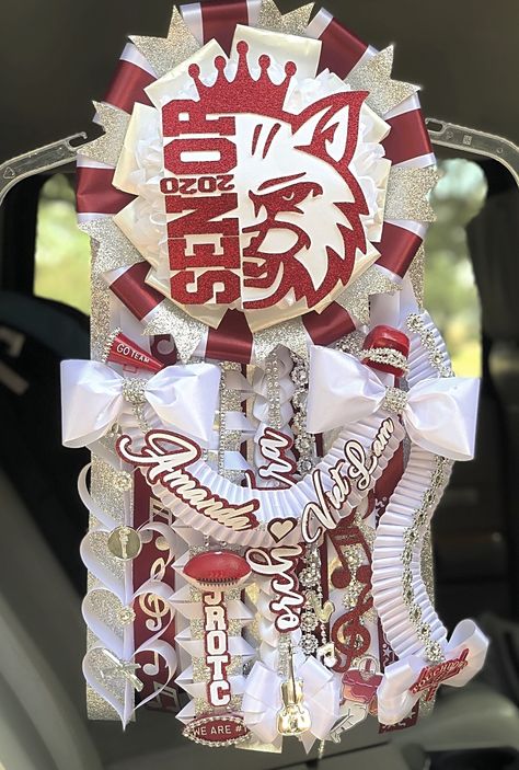 Clear Lake Homecoming Mum for senior, Classic sized. Custom made topper, 12 inches of length and 7.5 inch flower. Email morganmadegoods@gmail.com for a quote on custom homecoming items! Homecoming Mum Toppers, Homecoming Mum Base, Maroon Black And White Homecoming Mum, Homecoming Gaters, Two Flower Homecoming Mum, How To Make Mums, Homecoming Braids, Big Mum, Homecoming Mum Neck Strap