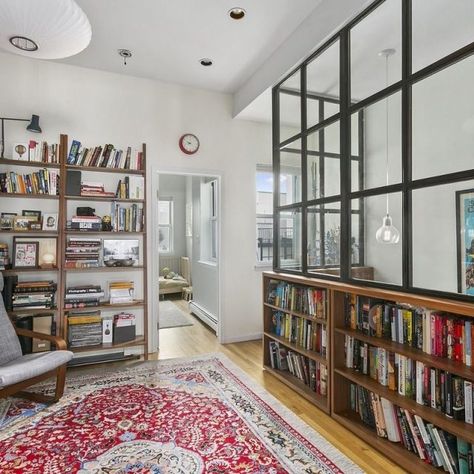 Old and new meet at this $1.4M Greenpoint duplex with brick feature wall and glass-enclosed staircase | 6sqft Enclosed Staircase, Glass Wall Office, Glass Wall Design, Loft Windows, Brick Feature Wall, Window Walls, Glass Partition Wall, Glass Room Divider, Loft Wall