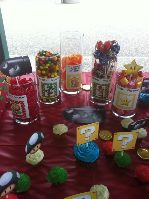 Mario candy bar Mario Themed Candy Bar, Mario Candy Table Ideas, Super Mario Bros Candy Table, Mario Birthday Candy Table, Mario Themed Candy, Super Mario Candy Table Ideas, Mario Snacks Food Ideas, Mario Candy Table, Mario Snacks