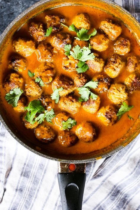 Easy Tikka Masala Meatballs. Pretty good (girls LOVED it). Made as written except: used 2 lbs hamburger (too much), used half the cayenne (do NOT use all if Danni is eating; add more to individual plates), juice of 1/4 lemon (leave as 1/4 lemon) and pecan meal in place of almond. Served over rice noodles. RESERVE OVEN JUST FOR THIS (do not cook vegetables in oven). Easy Tikka Masala, The Defined Dish, Defined Dish, Primal Recipes, Chicken Tikka Masala, Paleo Whole 30, Paleo Dinner, Chicken Tikka, Tikka Masala