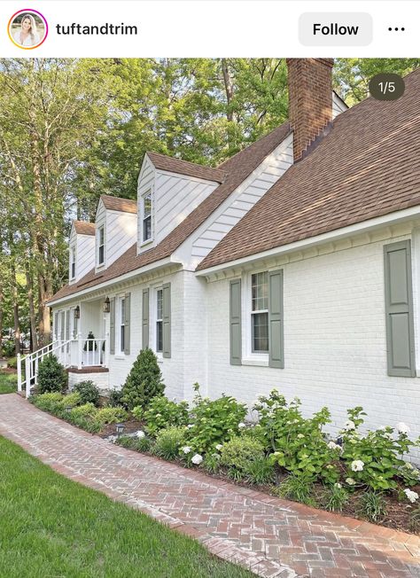 White Farmhouse Landscaping Front Yard, Farmhouse Hydrangea Landscape, Cottage Front Landscaping, French Cottage Landscaping, Front Yard Hydrangea Landscaping, Courtyard Front Of House, Green Shutters White House, New Home Exterior Ideas, Adding Character To A Builder Grade Home