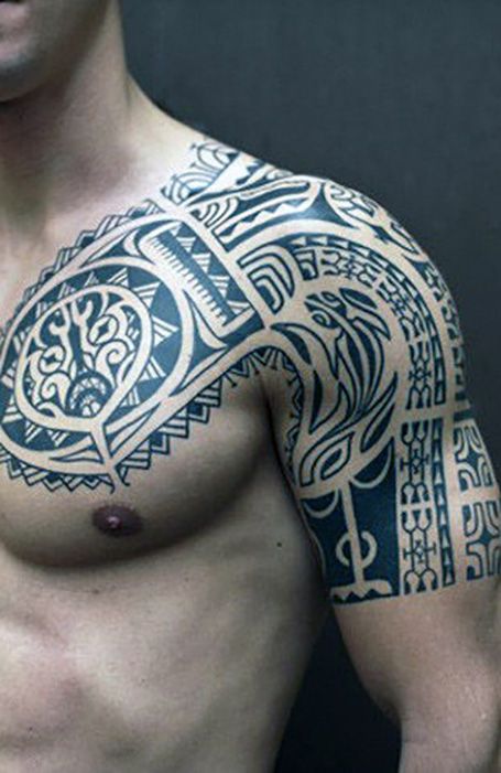 25 Coolest Shoulder Tattoos for Men in 2020 - The Trend Spotter Men’s Chest And Shoulder Tattoo, Tatoos Men Shoulder Ideas, Roman Shoulder Tattoo, Shoulder Wrap Tattoo For Men, Men Tattoo Shoulder, Shoulder Cap Tattoo For Men, Male Shoulder Tattoo, Chest And Shoulder Tattoo, Jason Tattoo