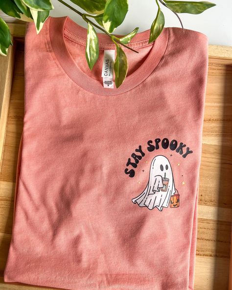 The cutest lil combo that you ever did see🥰👻🎃✨ ✨Iced Coffee Ghost Glass Cup ✨Stay Spooky T-Shirt Available in my Etsy Shop! Link in the bio💕 #ghostlife #stayspooky #halloweenvibes #spookyseason #coffeetime #icedcoffee #cutecups #cutetees #halloweenlover #halloween #tshirtshop #smallbusiness #smallbiz #explorepage #spookyvibes #icedcoffeeaddict Stay Spooky Shirt, Halloween Tshirt Ideas, Iced Coffee Shirt, Spooky Tshirt, Spooky Graphic Tees, Clothes Embroidery, Coffee Lovers Gift, Clothes Embroidery Diy, Coffee Funny