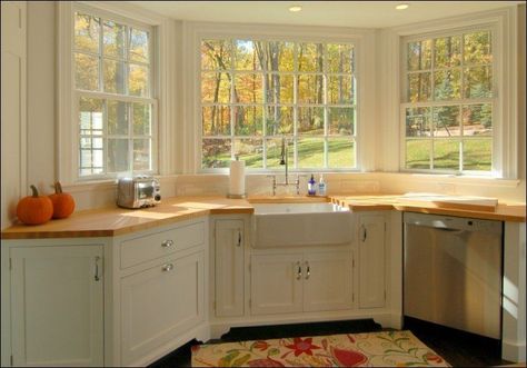 lovely kitchen with wooden countertops Kitchen Bay Window Over Sink, Corner Kitchen Sink Ideas, Kitchen Sink Remodel, Corner Kitchen Sink, Kitchen Bay Window, Kitchen Sink Window, Kitchen Layouts With Island, Corner Sink Kitchen, Kitchen Sink Design