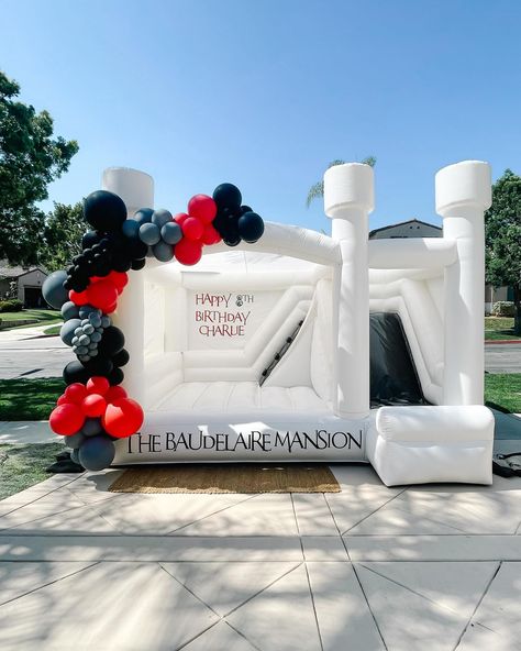 Welcome to The Baudelaire Mansion! Shown here: The Action Package which includes a 10' balloon garland & custom vinyl. . . . #whitebouncehouse #whitebouncehousesandiego #modernbouncehouse #balloonssandiego #balloondecor #balloongarland #sandiegoparty #sandiegopartyplanner #sandiegopartydecor #sandiegokids #sandiegomoms #sandiegodads #aestheticparty #castlebouncehouse #whitebouncyhouse #smallbusinesssandiego #tuftexballoons #betallatexballoons #qualatexballoons #sempertexballoons #eventcommu... White Bounce House Balloon Garland, Bounce House With Balloons, Bounce House Balloon Garland, Black Bounce House, San Diego Kids, Castle Bounce House, Qualatex Balloons, Bouncy House, Bounce House