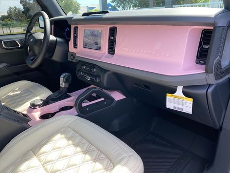 Ford Bronco Aesthetic Interior, Black Bronco With Pink Accents, White Bronco With Pink Accents, Pink Bronco Sport, Hot Pink Bronco, Pink Truck Interior, Pink Bronco, Bronco Interior, White Bronco