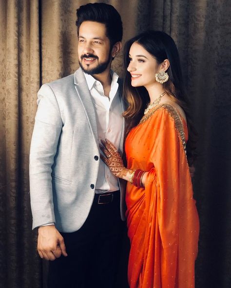 15 Brides Who Wore The Prettiest Outfits On Karwa Chauth 2019 | ShaadiSaga Lehenga Poses With Husband, Couple Poses In Sarees, Couple Pose In Traditional Dress, Saari Poses Couple, Couple Traditional Outfits Indian Saree, Traditional Saree Couple Poses, Couple Photoshoot Poses Indian Saree, Prewedding Photography Saree, Traditional Couple Photos