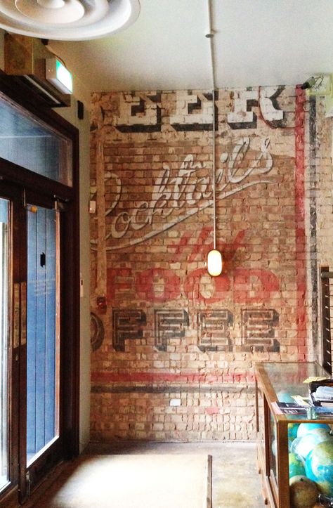 Brick wall mural, John Salt Brick Signage, Brick Wall Office, Steakhouse Restaurant Design, Brick Wall Mural, Sport Bar Design, Brick Cafe, Second Rodeo, Brick Wall Decor, Bar Decorations