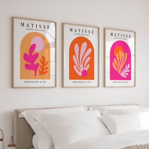 Elevate your space with this vibrant Set of 3 Matisse Prints in Pink & Orange. These colorful wall art pieces bring a funky, preppy aesthetic to any room, making them perfect for apartments, college dorms, and girls' rooms. The bold pink and orange hues create a trendy triptych that adds a burst of energy and style to your decor. Ideal for anyone looking to infuse their space with personality and contemporary flair, these prints are versatile and can seamlessly fit into various decor styles. Whe Bathroom Decor Pink And Orange, Pink Orange Yellow Room Decor, Orange And Pink Living Room Decor Ideas, Orange Toned Bedroom, Pink Orange Wall Art, Pink And Orange Interior Design, Pink And Orange Room Ideas, Red And Pink Aesthetic Room Decor, Orange And Pink Wall Art