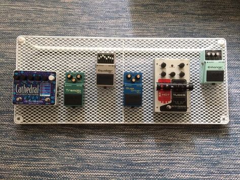 Why spend time and money searching for one when you can make your own fantastic pedalboard from IKEA in less than ten minutes? Homemade Pedalboard, Diy Guitars, Lack Wall Shelf, Ikea Hacks For Cats, Pedalboard Design, Small Pedalboard, Diy Pedalboard, Bass Pedalboard, Desktop Pedalboard