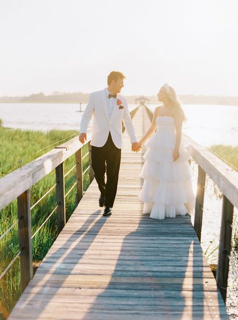 Bride and groom walk on the dock during sunset at wedding venue in downtown Charleston. East Coast Destination Wedding Photographer. Italy Wedding Dress, Lowndes Grove Wedding, Charleston Wedding Venues, Blue White Weddings, Winter Wedding Colors, Charleston Wedding Photographer, Film Wedding Photography, Southern Weddings, Groom Portraits