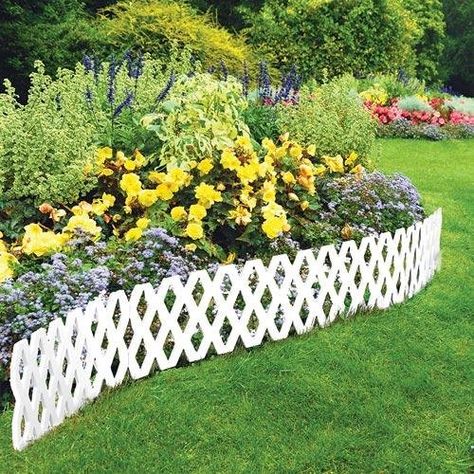 Fences and walls in a garden are just like the walls in your house, providing an opportunity to display art, show off your personality, and cover up peep holes. These ideas come from my own garden and gardens I have visited. Some items can be made from repurposed items, and others are store-bought garden decor. … Plastic Garden Edging, Lattice Garden, Plastic Garden, Privacy Landscaping, Lattice Fence, White Picket Fence, Lawn Edging, Garden Shrubs, Garden Edging